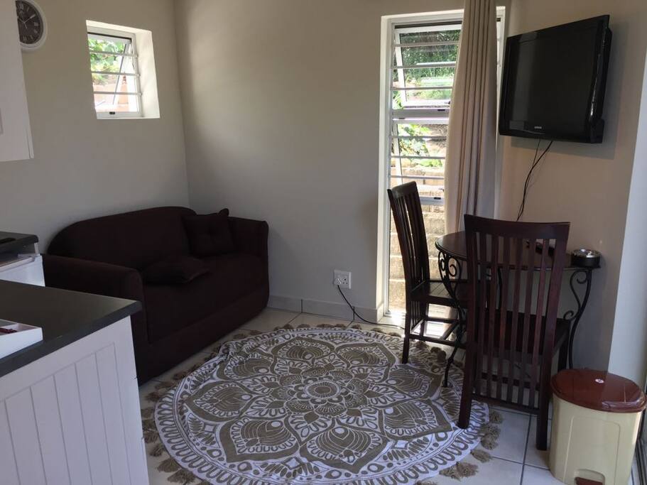Open plan lounge area with desk