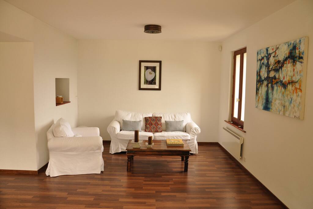 One side of the living room with sofa bed