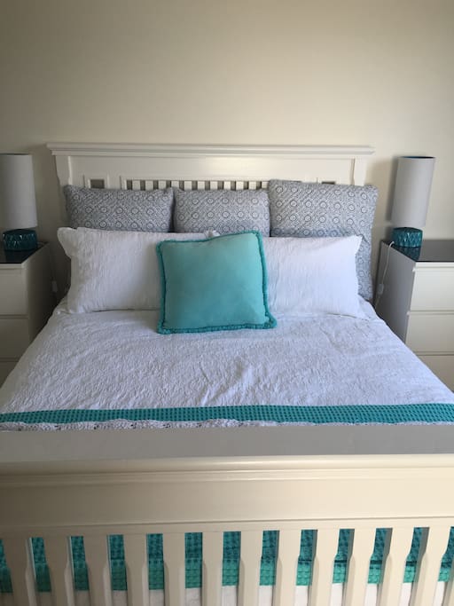 Queen bed in main bedroom