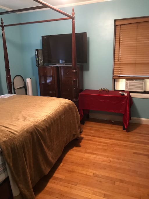 Flat screen TV, AC Unit, Queen Size bed... What more could you want?