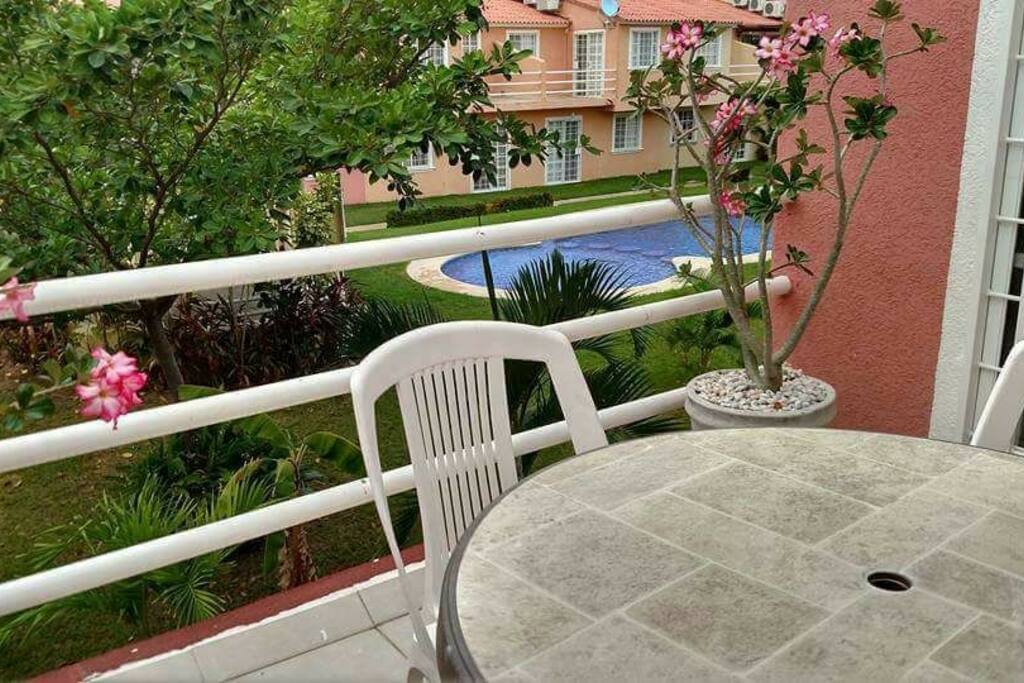 Terraza, alberca compartida