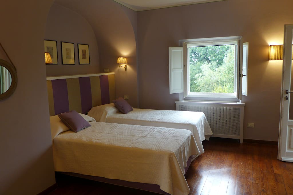 Double bed room opening on the garden with A/C