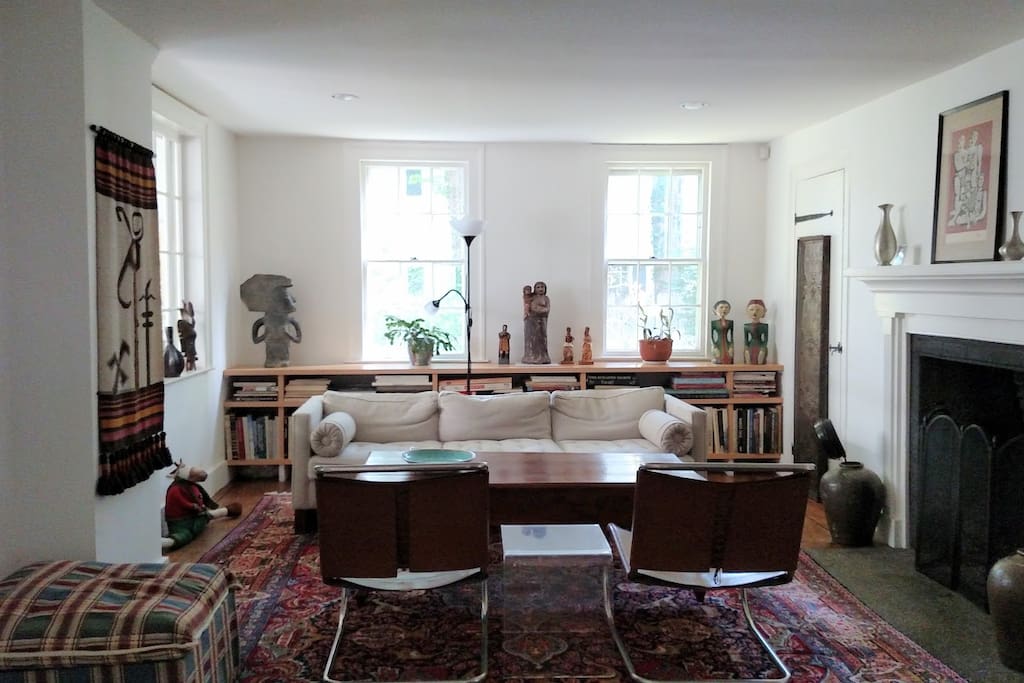 A gracious Living Room with Mies van der Rohe chairs and sofa