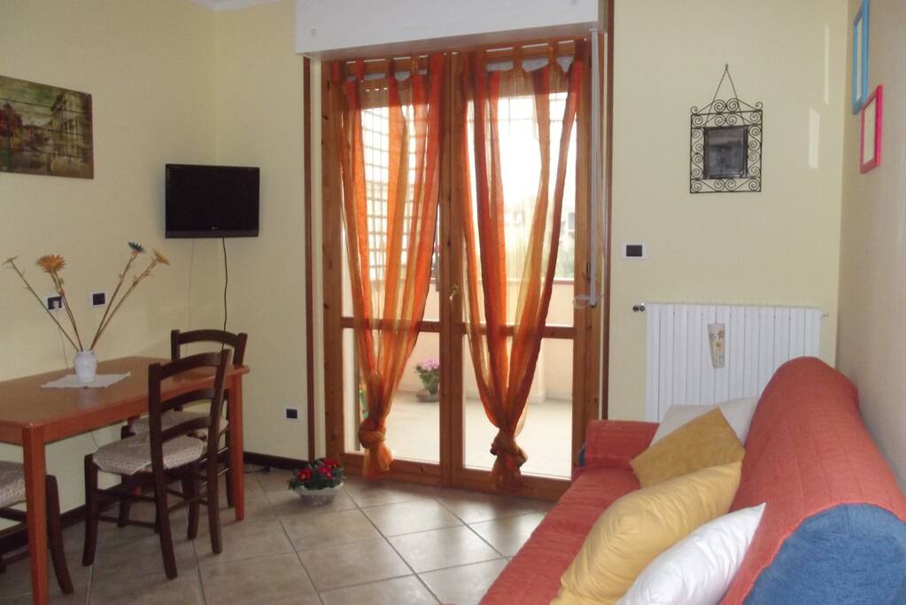 Soggiorno con accesso al terrazzo