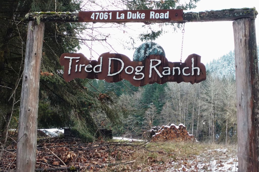 Signage at entry of Tired Dog Ranch located approximately 4 miles west of Oakridge/Westfir.
