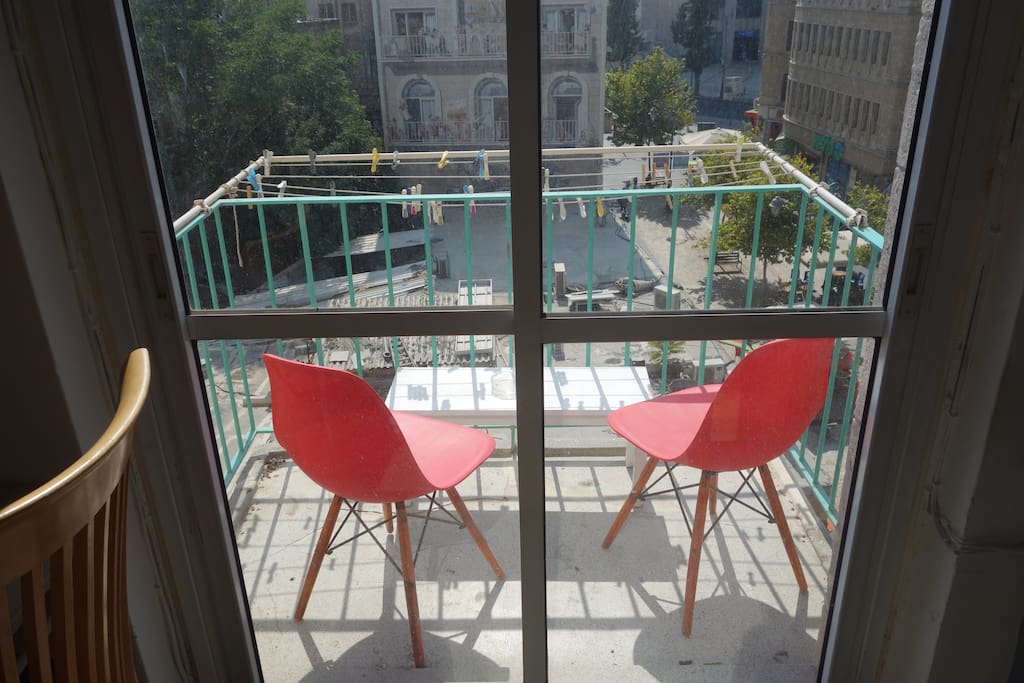 the balcony is perfect for a cold beer or a fresh cup of coffee and is located right over the heart of Jerusalem's heart - Ben Yehuda street.