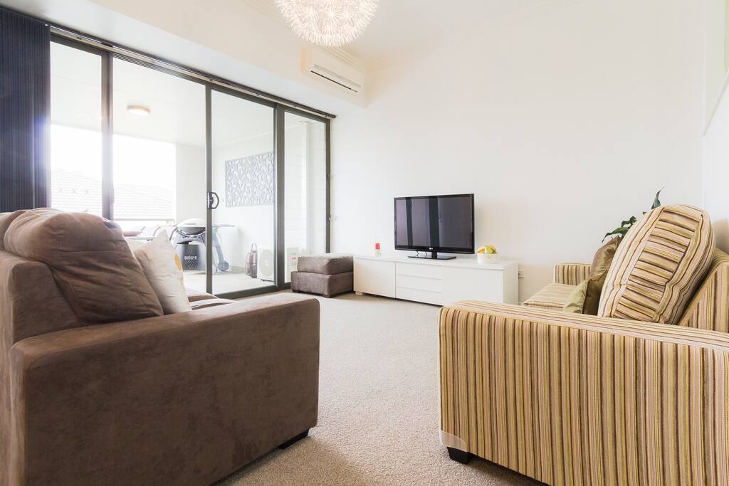 Double size sofa bed in lounge with sprung mattress.