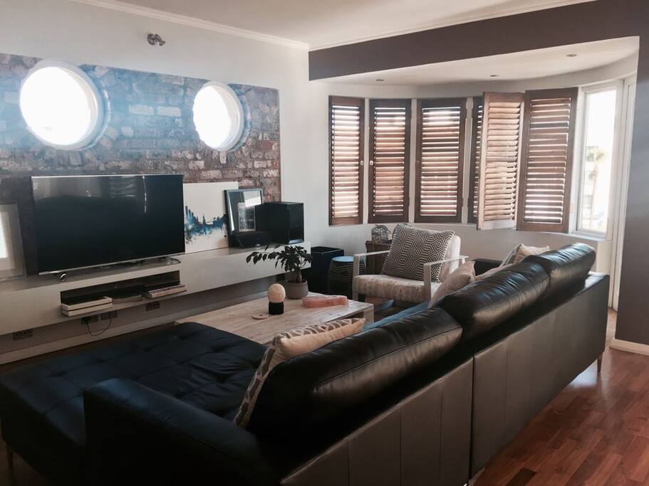 Lounge area with smart TV.
