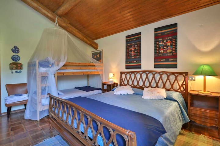 Bedroom with double bed and bunk bed