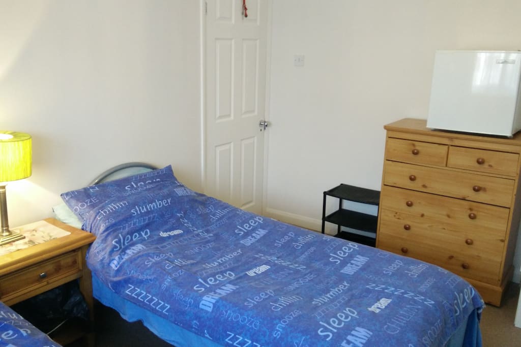 Room includes a mini-fridge