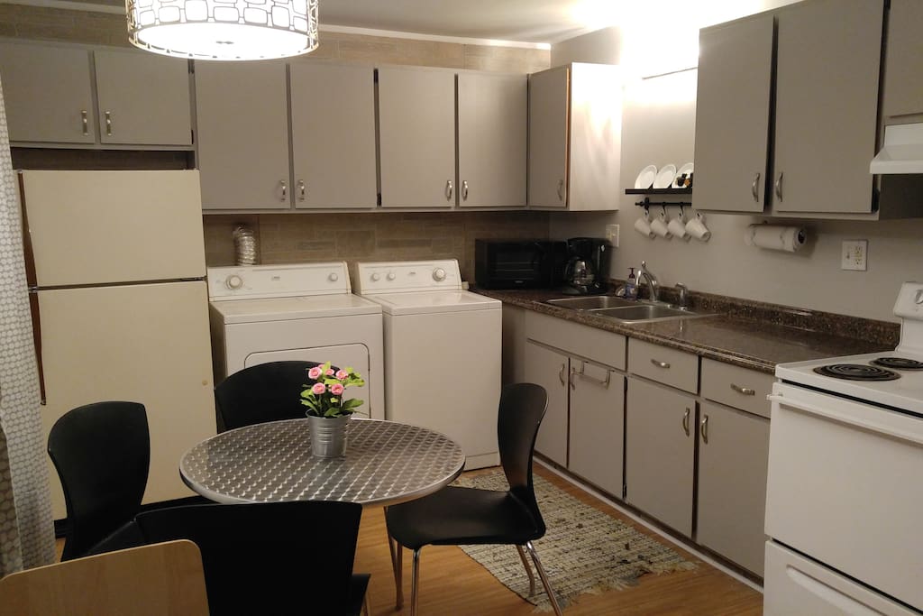 Updated kitchen with washer/dryer and microwave.