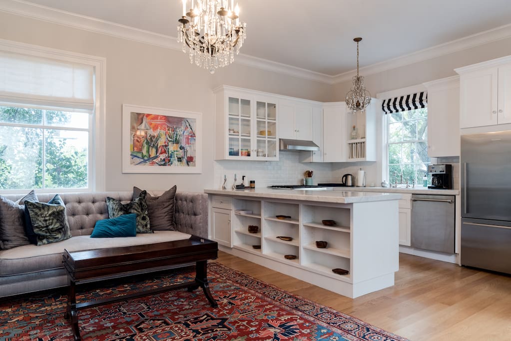 Living space with full kitchen and queen pull out bed