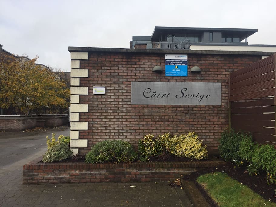 The entrance of the apartment block