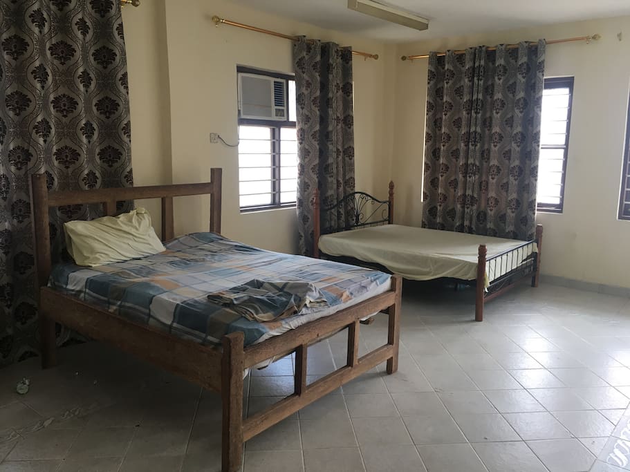 Two beds,pretty ideal for back packers,short/long staying tourists ac working and very spacious.