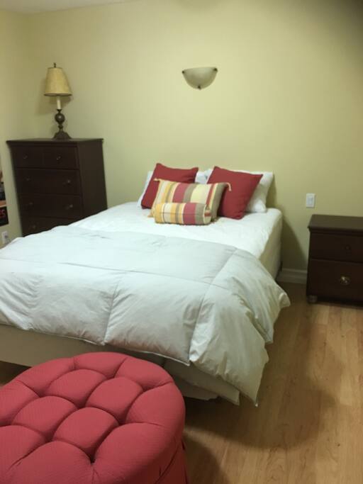 2nd bedroom with queen bed , dresser, night Table and Closet