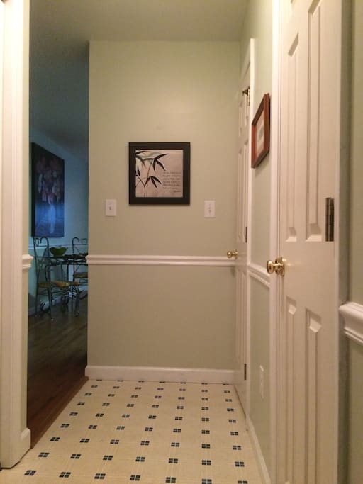 Mudroom. Laundry to the left, half bath and pantry to the right.