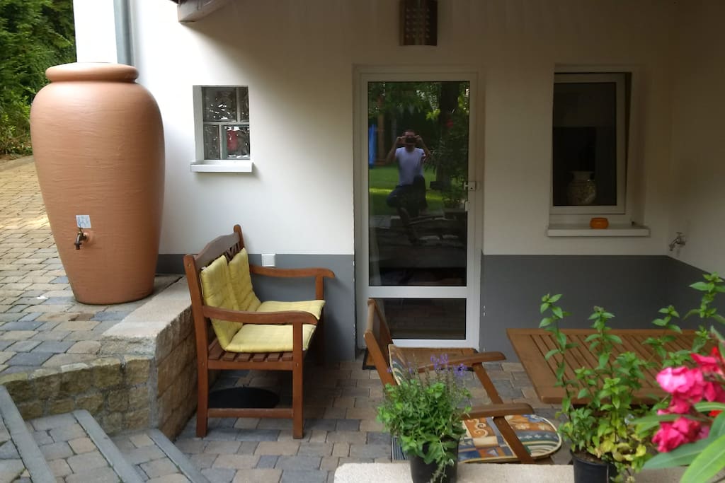 Entrance of apartment with small private terrace