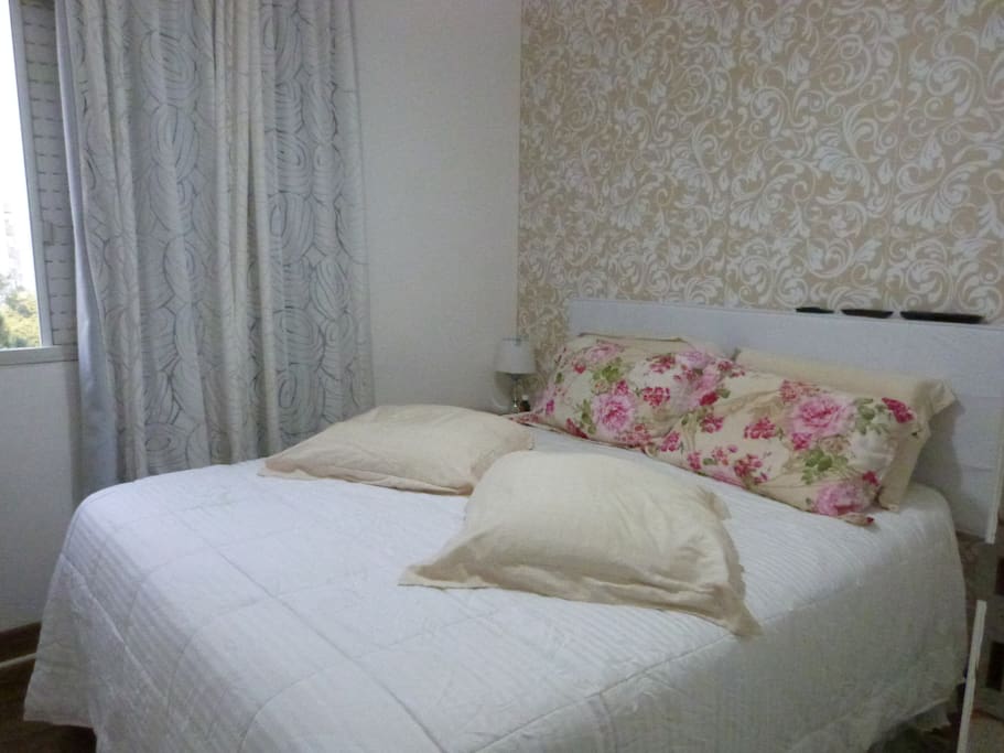 Quarto principal cama Queen