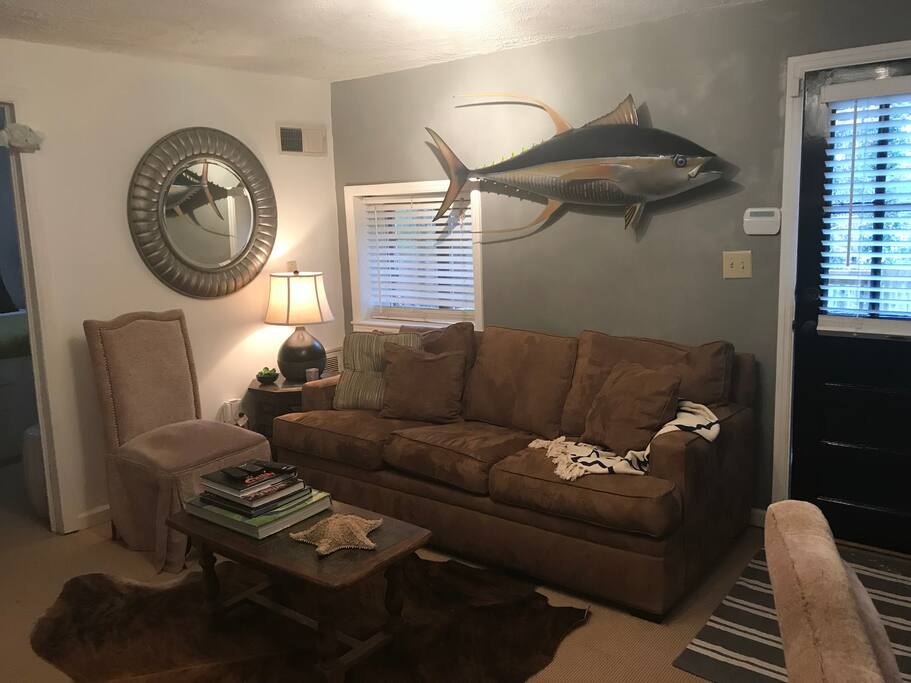 Living area - queen size sofa bed. Large 4K smart tv is across from sofa. Twin air mattress is also available.