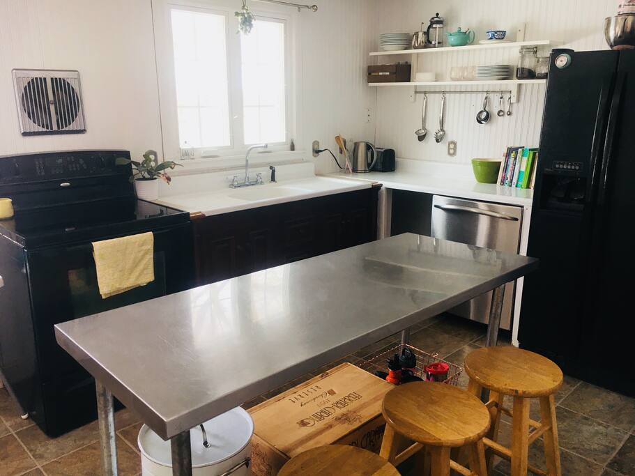 Clean, bright, functional kitchen.