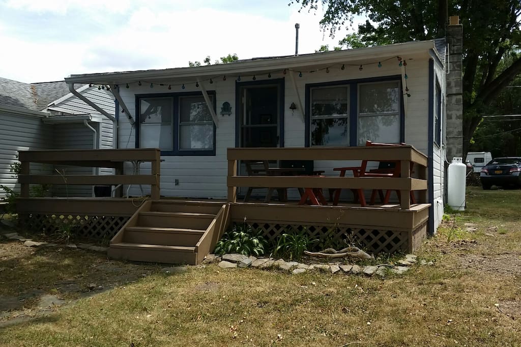 Exterior View with a shaded lakefront lawn