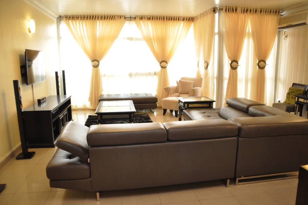 Downstairs living room featuring flat screen with cable and surround sound