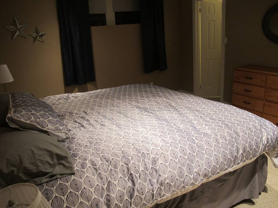 Bedroom with view of walk-in closet