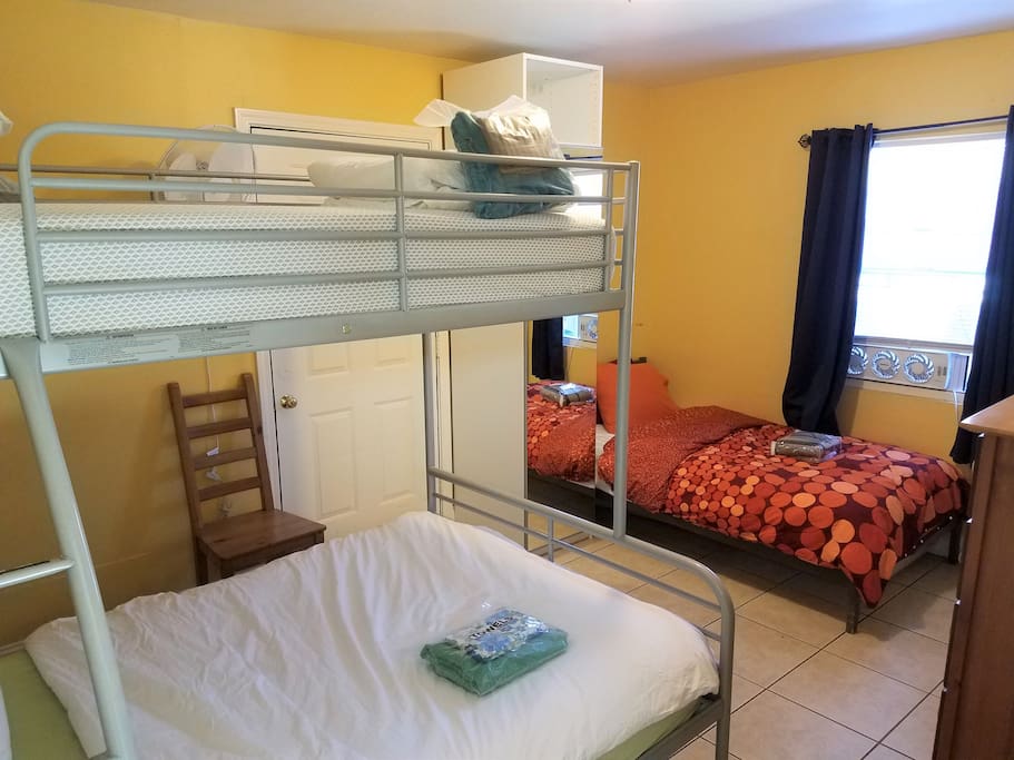 The room has a total of 3 beds
