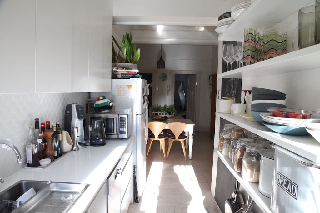 Kitchen through to dining and bedroom