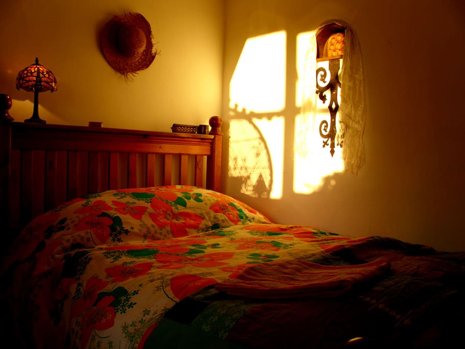 The double bed (with firm orthopaedic mattress)