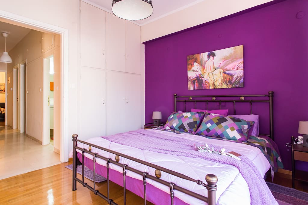 The purple bedroom from anothe view.