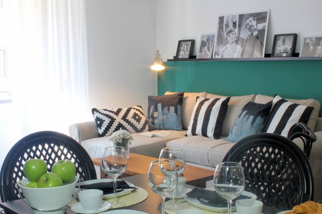 Living room with sofa-bed (for 2 people), dining table & TV