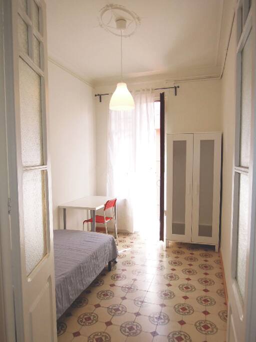bedroom with balcony