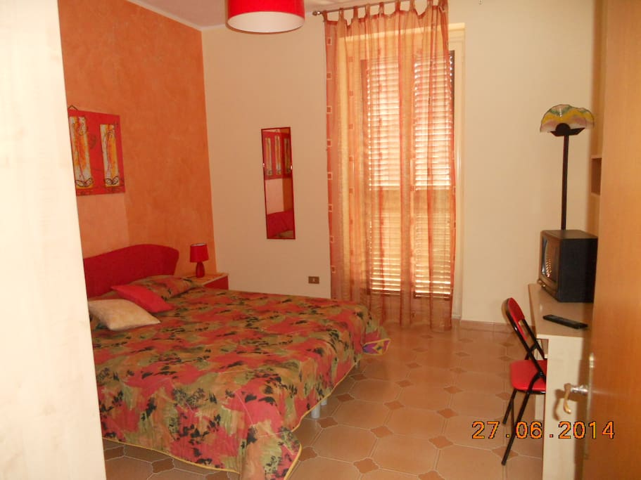 camera da letto con balcone