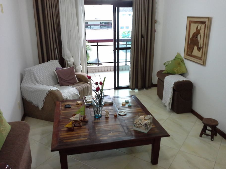 Sala com sofá cama confortável