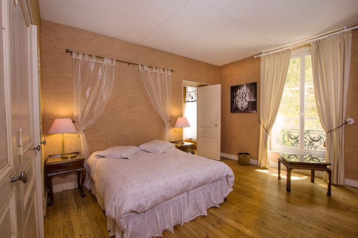 Spacious master bedroom has a garden view. Queen bed can convert to 2 single beds.