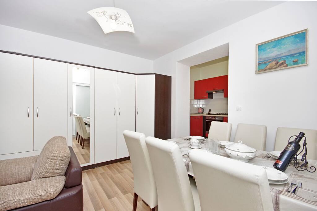 Wardrobe, kitchen, seating area