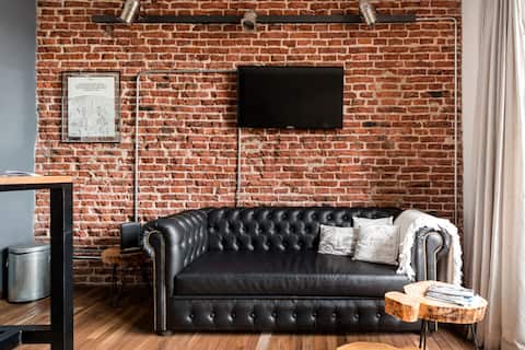 Propiedad de Airbnb exitosa: Beautiful industrial style apartment in the heart of Boulevard Caseros en Barracas
