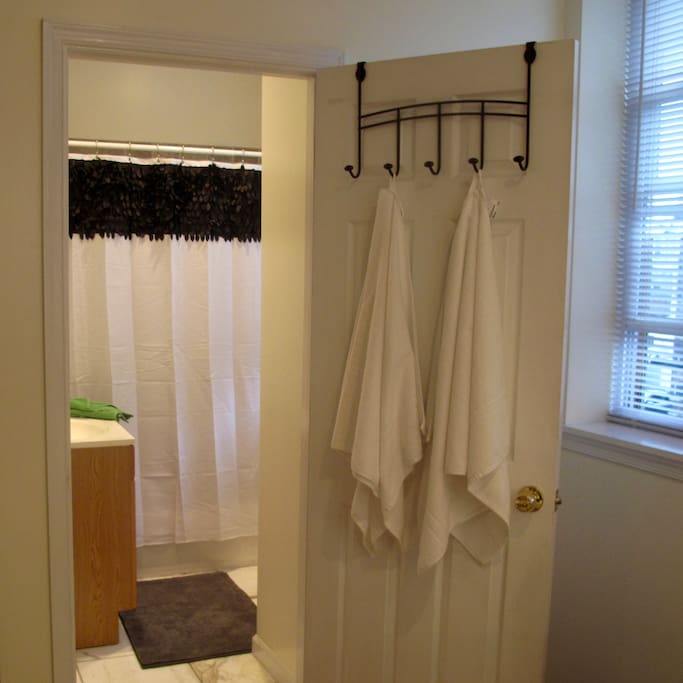 You can't miss the marble-floored bathroom, complete with our favorite plush towels and bath mats.