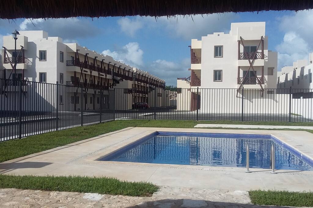 Piscina, área común.