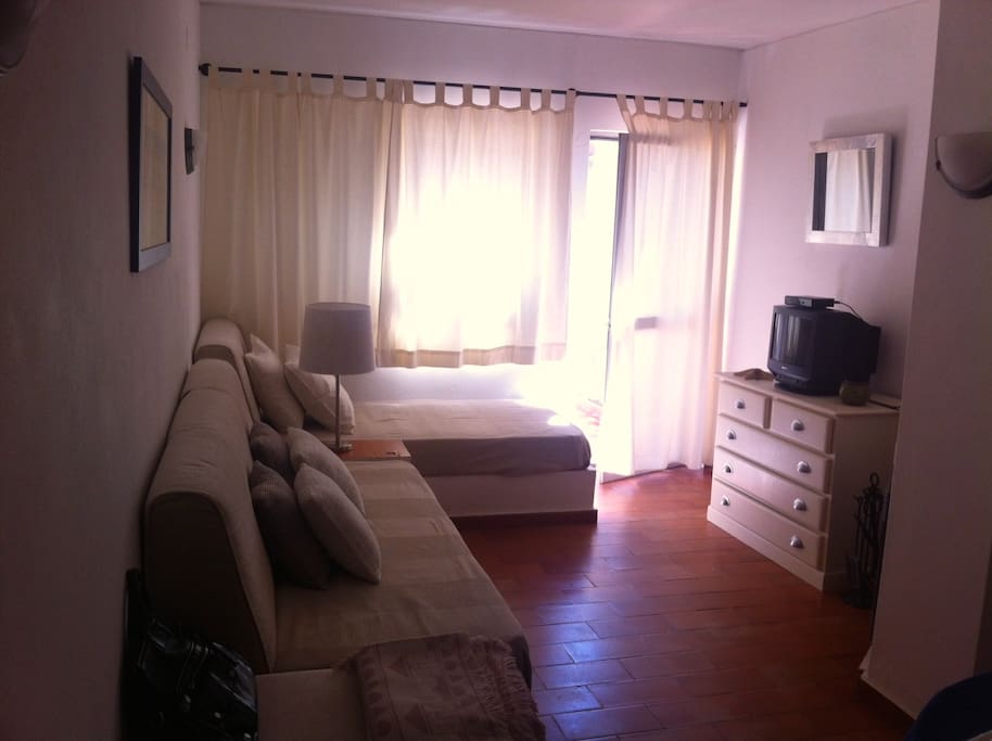 living room with 2 beds
