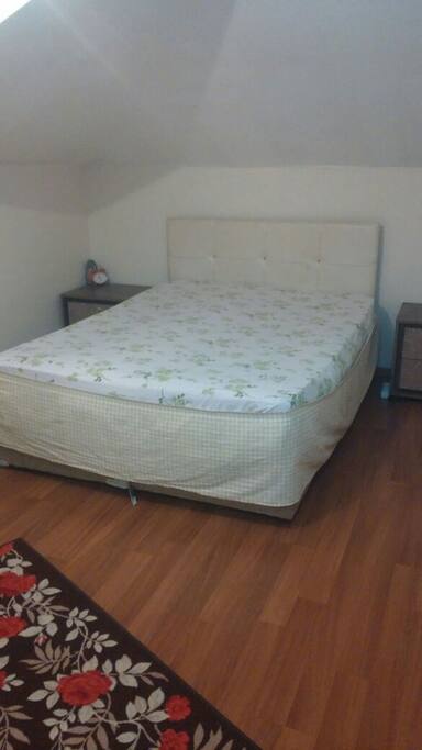 Big room and a big bed for a couple