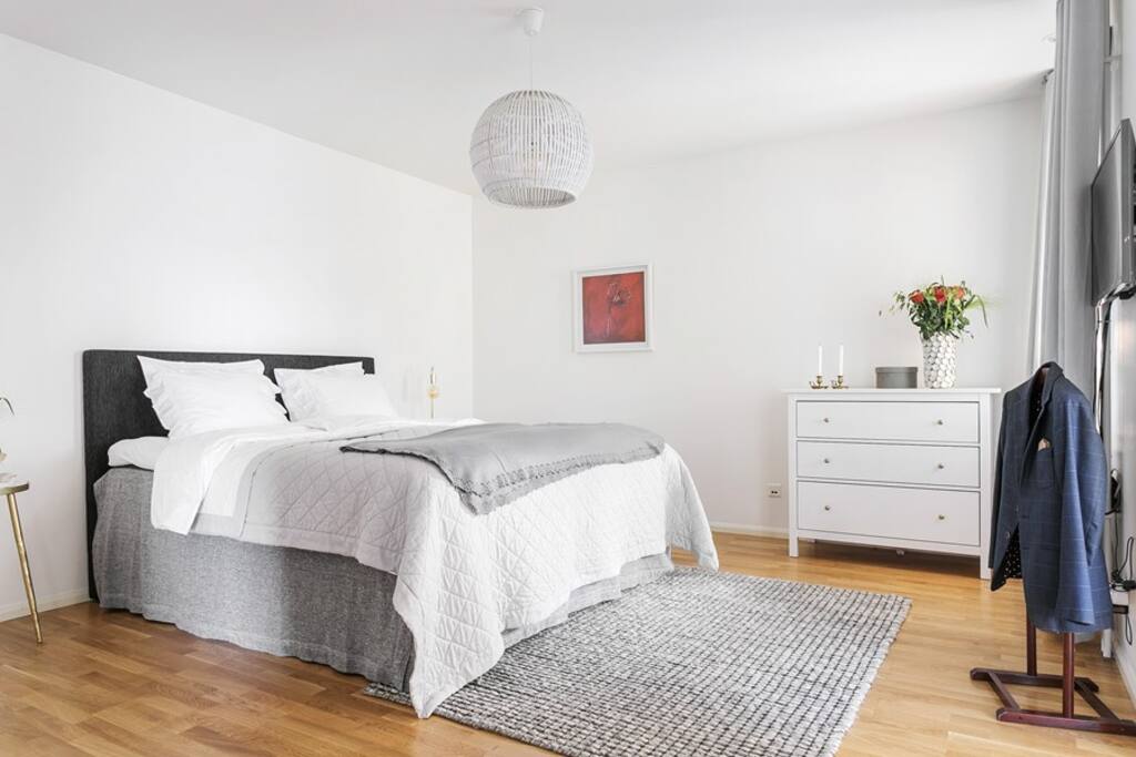 Master bedroom with king size bed.