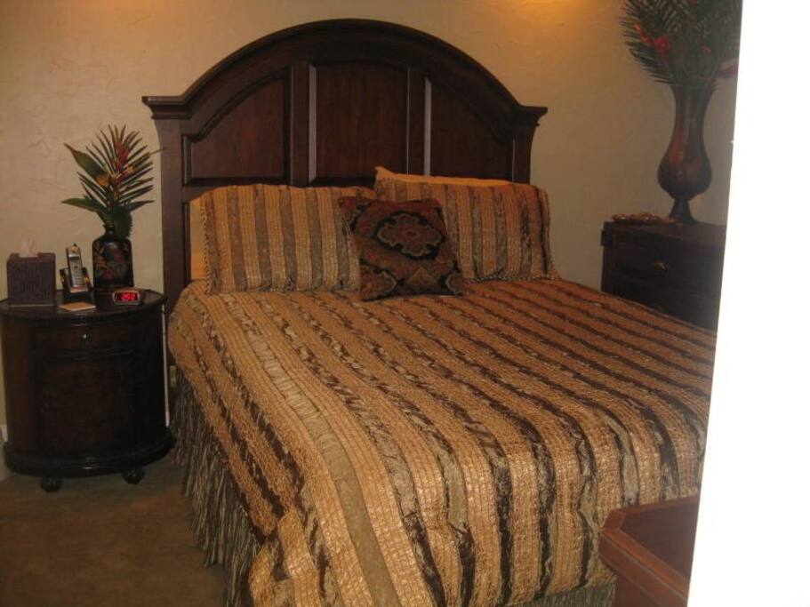 Luxury Master Bedroom with custom cherry cabinets.