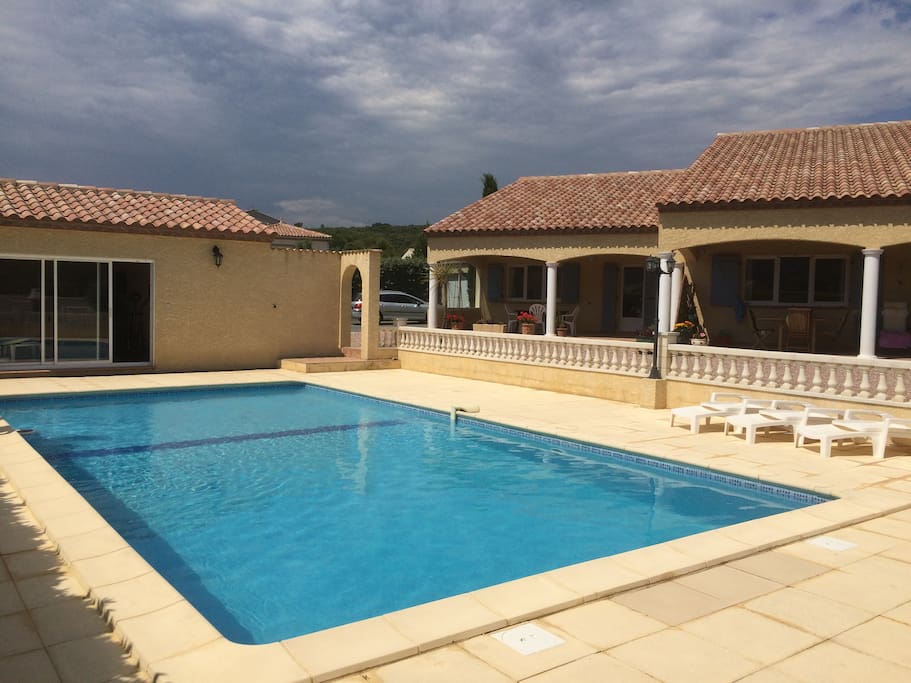 large pool area with loungers for you to enjoy