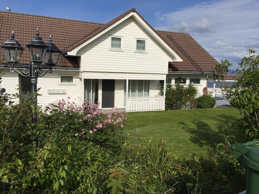 The apartment is in the ground floor of this villa by the sea on the island Mosterøy.