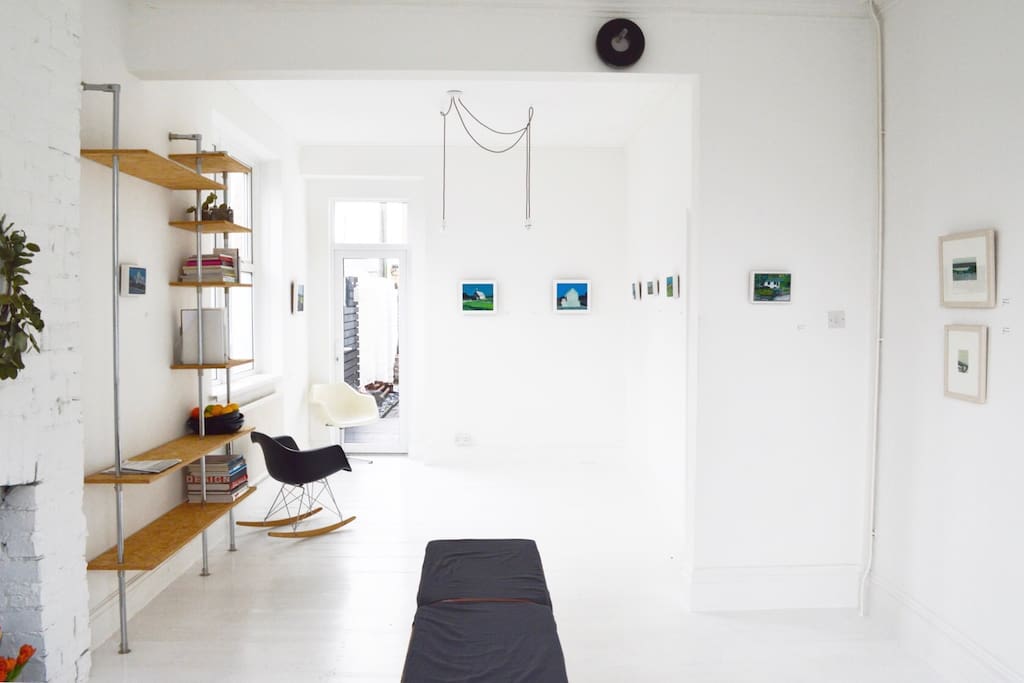 Lovely open plan living / dining room with light coming in via the large bay and side windows.