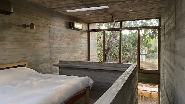 Double-height room and window