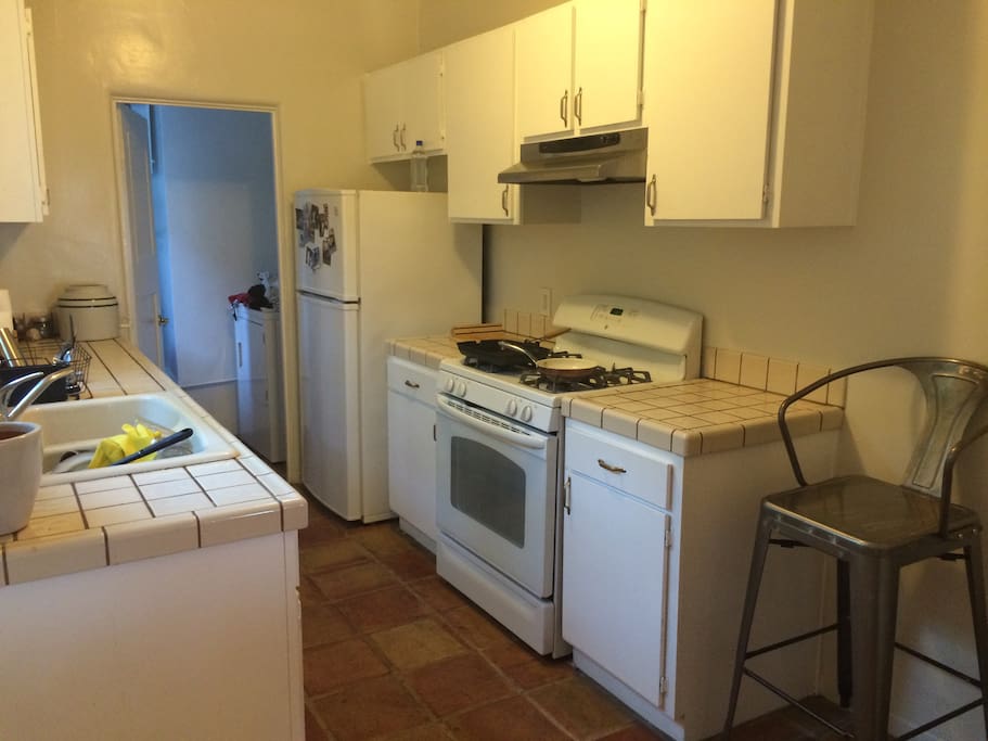 Full kitchen plus washer + dryer in the back