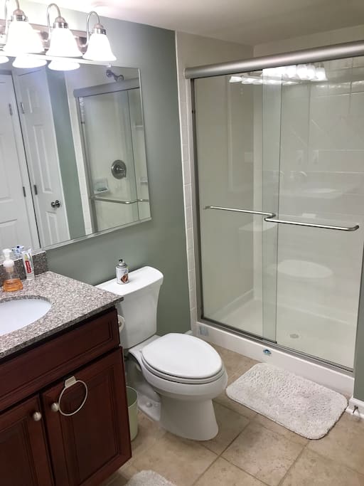 Private bathroom with shower. Towels are provided.